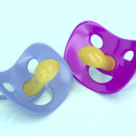 Our Placerville dentists talk about the risks of cleaning pacifiers with human saliva.