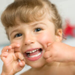 Children should begin flossing from two to six years of age, according to the Placerville Dental Group.