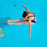 Diving into pools must be done safely to prevent dental injuries.
