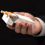Cigarettes are implicated in the development of gum disease.