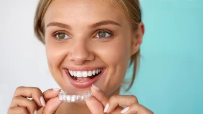 Smiling Woman With Beautiful Smile Using Invisalign